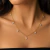 Choker Correntaria Vazada com Mini Corações Zircônia Pendurado ( Folheado a Ouro 18K e Prata 925 )