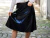 Falda acampanada Nena Eco Cuero Negro Metalizada - comprar online