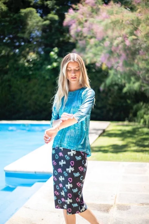 Remera pile Metalic turquoise. Mujer