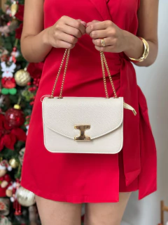 Bolsa alça dourada na internet