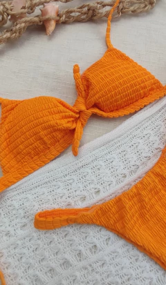CONJUNTO top laranja na internet