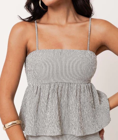 Blusa assis listrada na internet