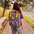 Mochila Quadrada Pompom na internet