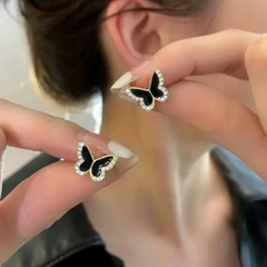 Aretes de Mariposa Negros con Incrustaciones de Zirconia para Dama en internet