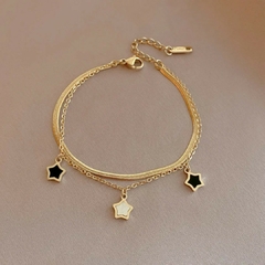 Pulsera de Estrellas de Titanio Dorado para Dama en internet