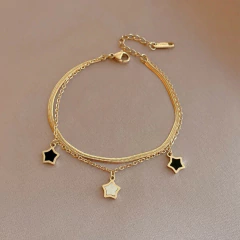 Pulsera de Estrellas de Titanio Dorado para Dama en internet