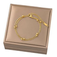 Pulsera Doble con Cuentas de Acero Inoxidable Chapado en Oro de 18K para Dama - comprar en línea