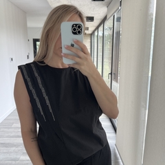 Musculosa Naina en internet