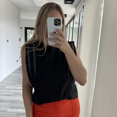 Musculosa Naina en internet