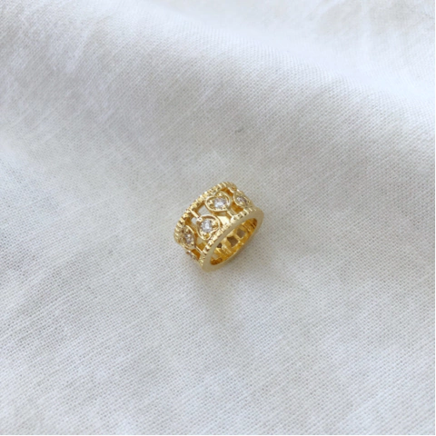 Pingente Stopper Corações vazados e zircônias banhado a ouro