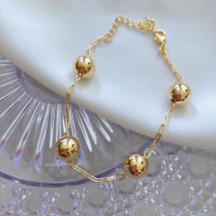 Pulseira de esferas lisas banhado a ouro - comprar online