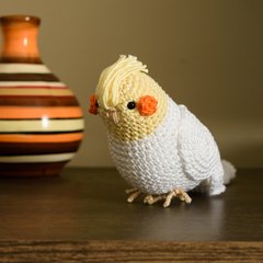 Calopsita amarela em amigurumi na internet