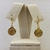 Brinco Medalha Pai Nosso Banhado a Ouro 18k - loja online
