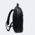 mochila de couro para notebook de 17 polegadas modelo kaia preto vista pela lateral com alças acolchoadas