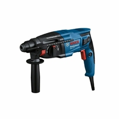 El martillo percutor Bosch GBH 220 es una herramienta eléctrica potente y versátil, ideal para trabajos de perforación y cincelado en materiales duros. Con una potencia de 720 W