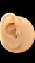 piercing - trágus crucifixo