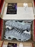 Air Max TN cinza na internet