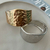 BRACELETE FOSCO MARTELADO FECHO MOLA FOLHEADO A PRATA - comprar online
