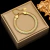 Pulsera viborita de acero quirúrgico color dorado con diseño ajustable sobre caja beige
