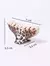 Pinza Triangulo animal print - comprar online