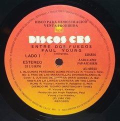 Vinilo Lp Paul Young - Entre Dos Fuegos 1986 Argentina PROMO - BAYIYO RECORDS
