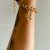 PL104 - PULSEIRA COM PINGENTE ESTRELA
