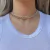 COLAR CHOKER ZOE DOURADO COM PRATA