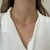 CL276 - CHOKER RIGIDA ARO ONDULADO FOLHEADO A OURO 18K