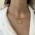 CL285 - CHOKER RIGIDA MEDALHA SÃO BENTO FOLHEADA A OURO