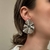 BR262P - PAR DE BRINCOS RIHANNA MARTELADO FOLHEADO A PRATA