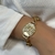 PL131 - PULSEIRA PINGENTE SÃO JORGE FOLHEADO A OURO