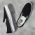 Tênis Vans Slip On Skate Black White na internet