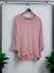 Blusa Caroline na internet