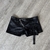 Short tiro bajo de cuero