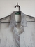 Camisa Benetton gris transparente, talle S en internet