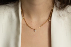 COLAR LILLY RODIO BRANCO na internet