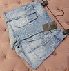 Short Emma cargo con sobrefalda adelante y lazo