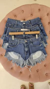 Short Sol tiro bajo deflecado azul