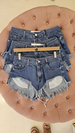 Short Sol tiro bajo deflecado azul