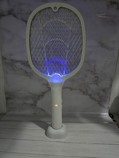 Mata Mosquitos Raqueta Moscas Insectos Con Base Recargable en internet