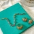 Conjunto Argola, Pulseira e Anel largo cravejado zircônias coloridas banhado a ouro 18k - comprar online
