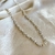 Choker elos arrendondados com mini esferas banhado a prata