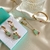 Conjunto Colar, Brincos, Bracelete e Anel retangular turmalina com flores e borboleta banhado a ouro 18k