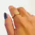 Anel aparador liso com zircônia central banhado a ouro 18k - comprar online