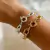 Pulseira elos grandes e fexo boia banhada a prata na internet