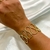 Bracelete largo orgânico ondulado banhado a ouro 18k