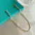 Choker riviera carrê diagonal 4mm cristal banhado a ouro 18k