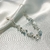 Pulseira delicada flores e ponto de luz 18cm banhado a prata