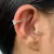 Piercing de pressão argola torcida e ponto de luz prata 925 - Karine Ramalho Joias