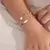 Pulseira pérolas e coração - loja online
